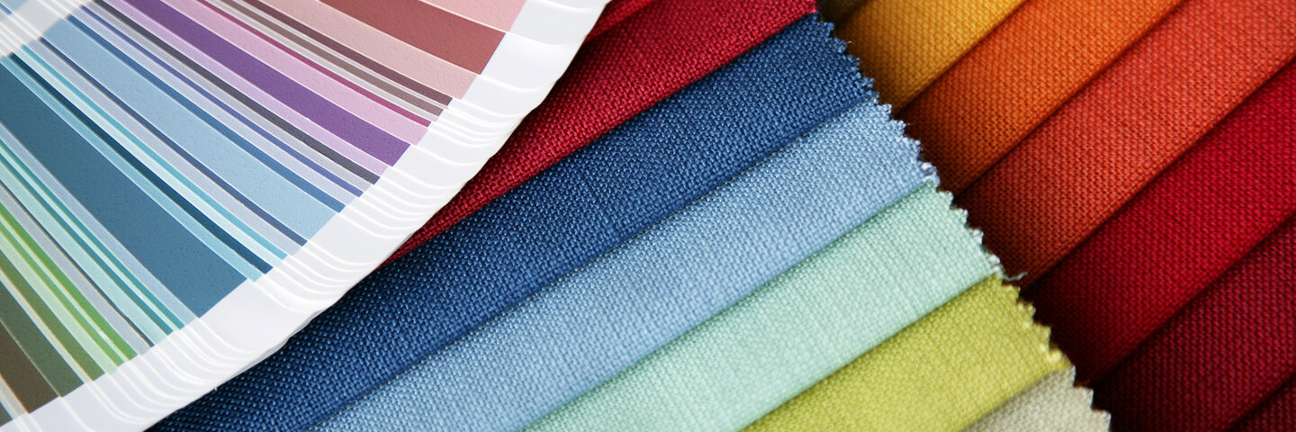 Color swatches on paper and fabric.