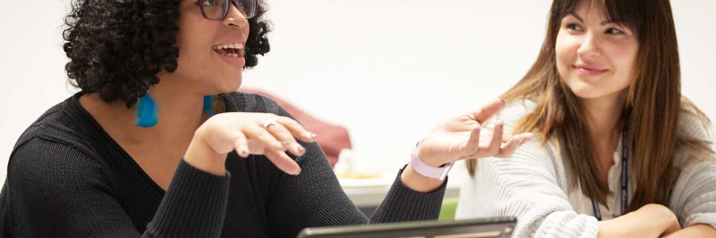 two writers mid-discussion