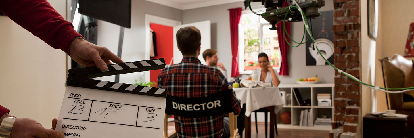 Actors and director on the set of a commercial