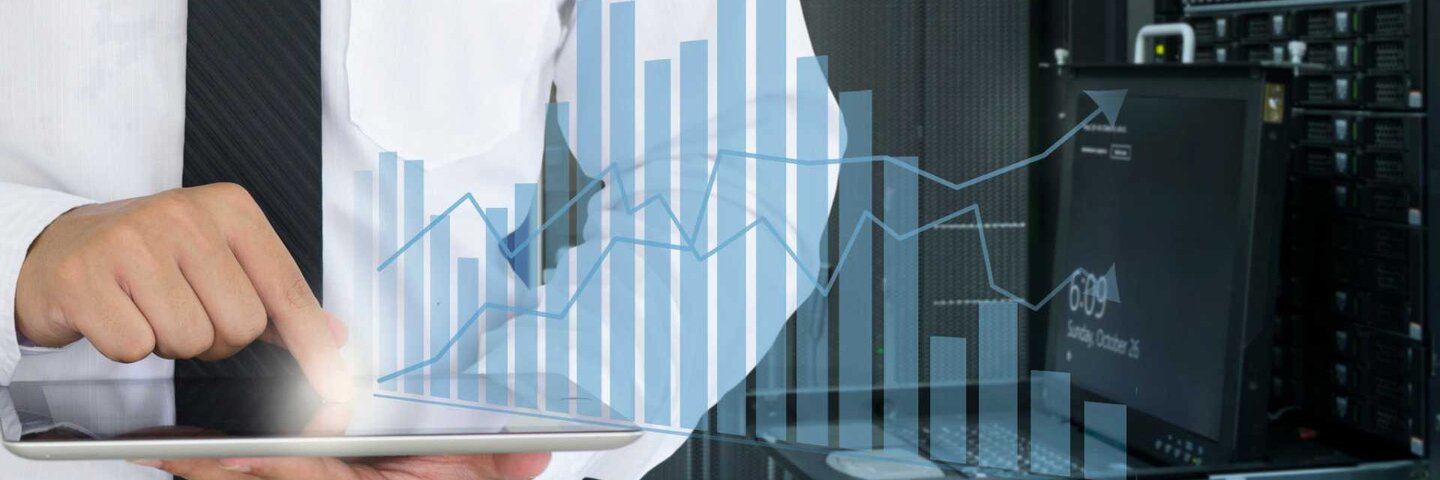 Business man use tablet for analyze in data center