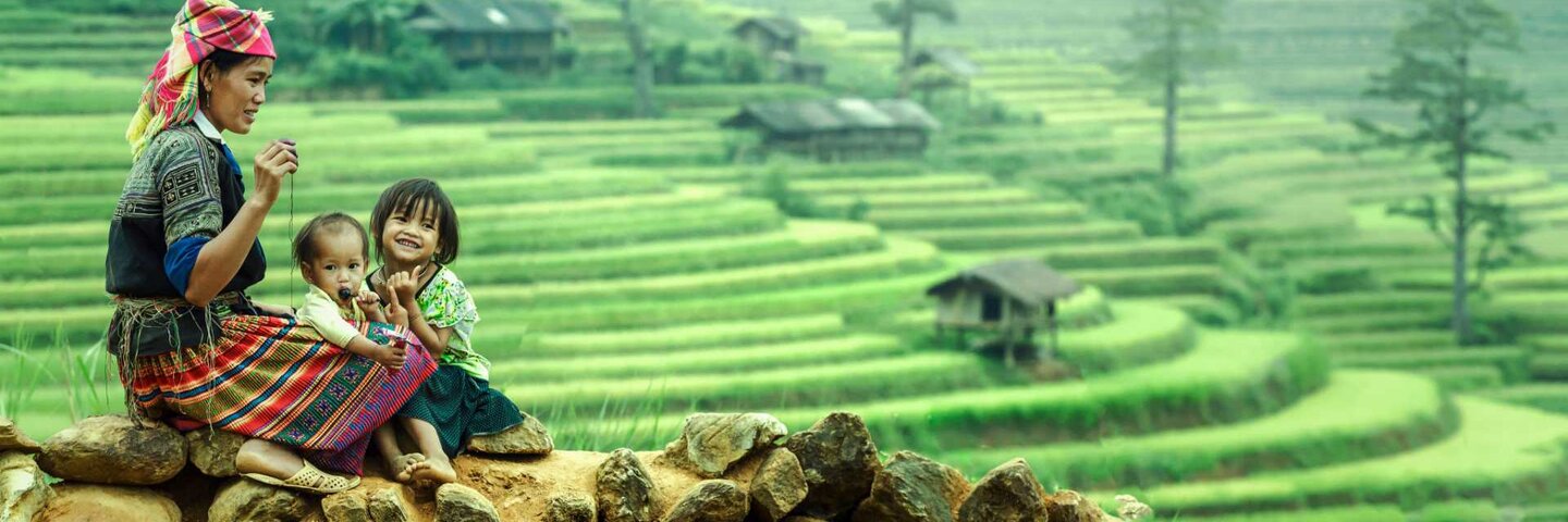 Tribal mother and children girl  in rice terraces of Vietnam