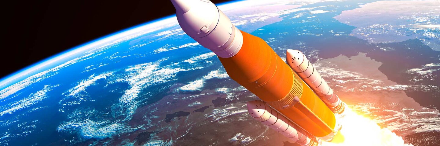 rocket launching into space. earth in the background