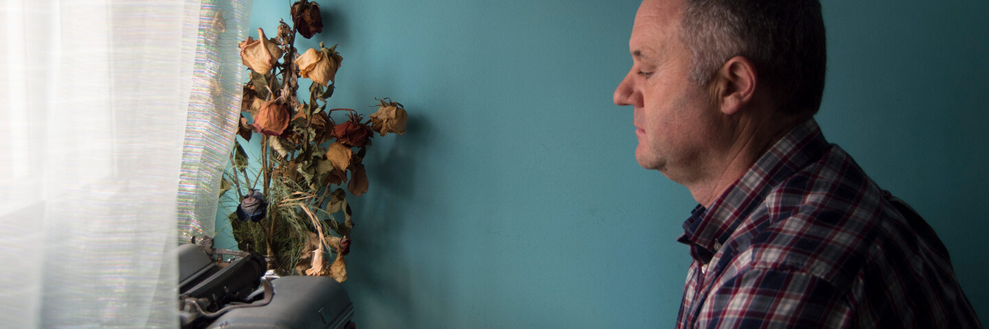 poet writing at his desk