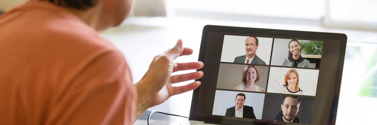 A business colleague working together through internet live streaming, video conferencing