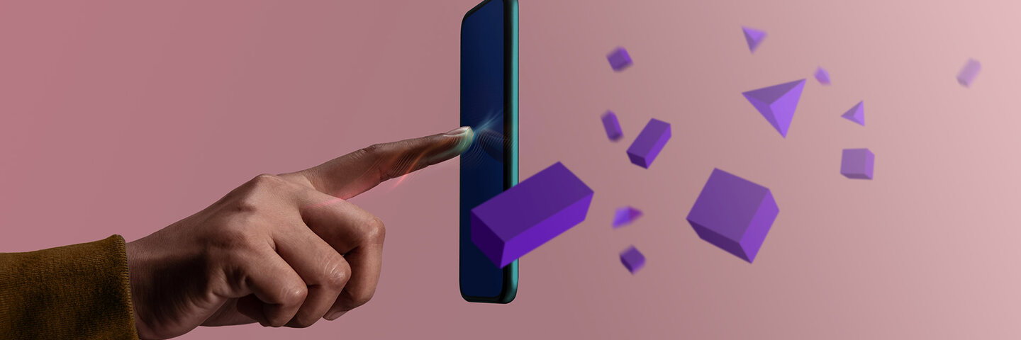 Man touching phone creating digital shapes