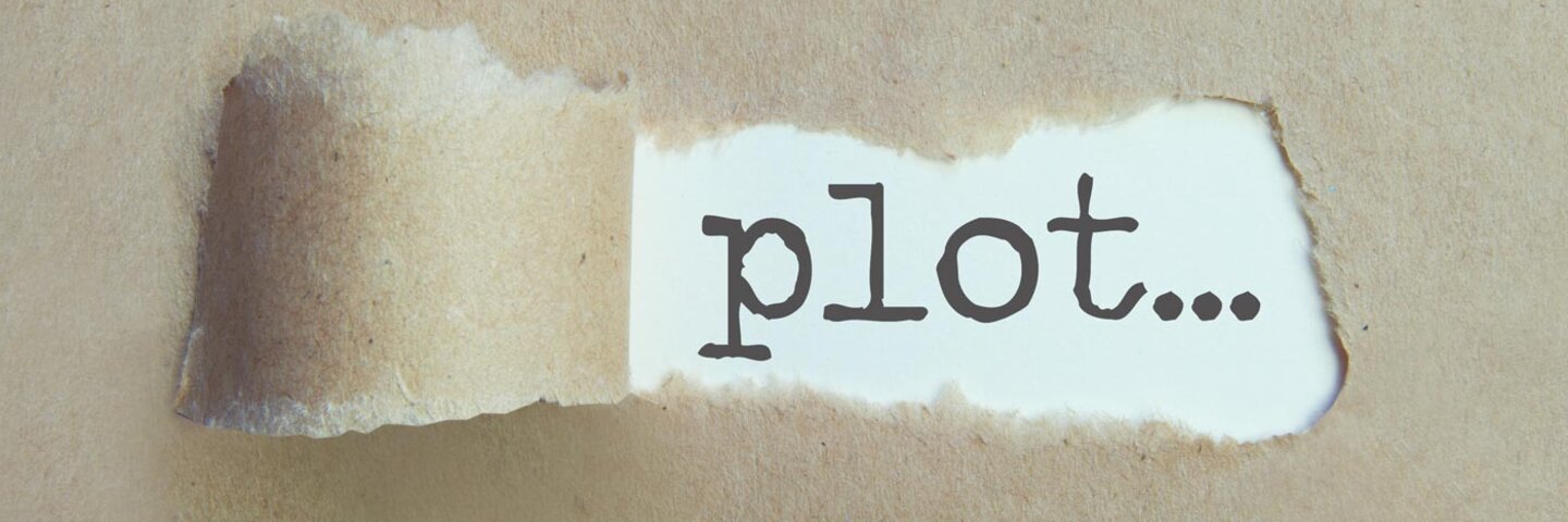 craft-paper-peeled-up-revealing-word-plot-on-paper