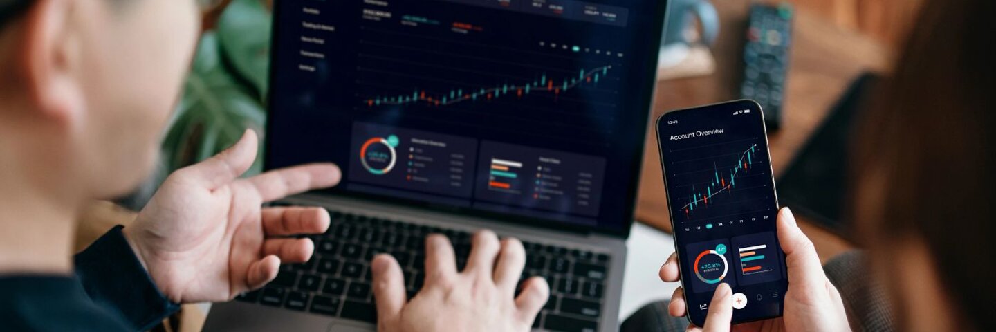 Young Asian couple managing finance online