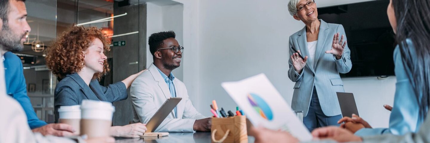 Team of happy professionals during a meeting.